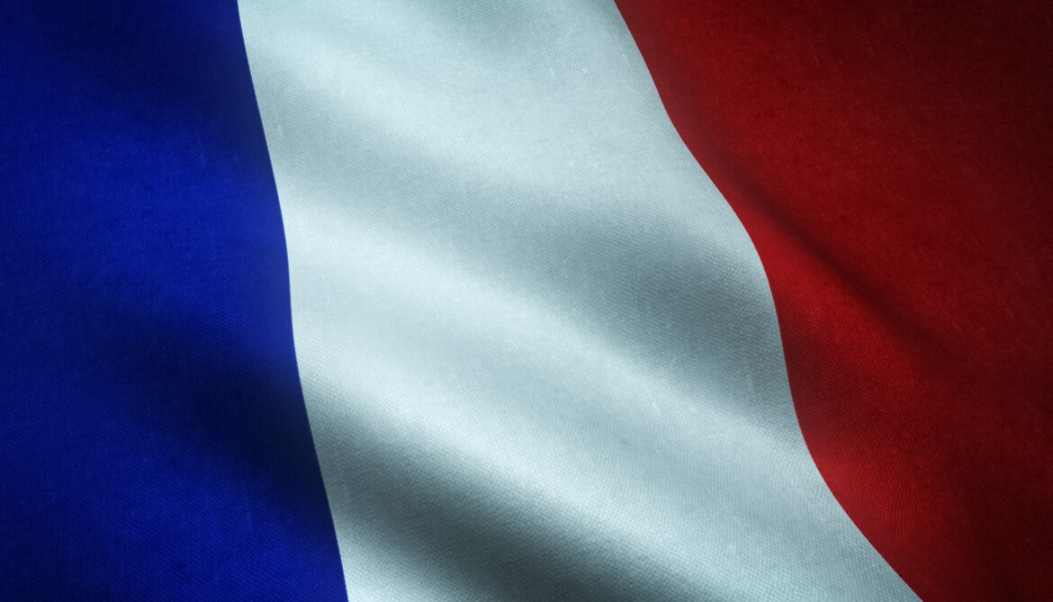 Closeup shot of the waving flag of France with interesting textures