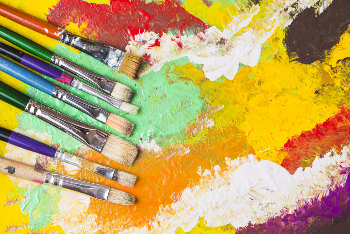 brushes-on-colorful-painting
